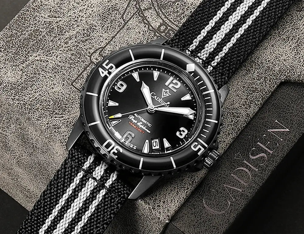 CADISEN Deep Explorer watch with black dial, luminous hands, MIYOTA movement, striped canvas strap