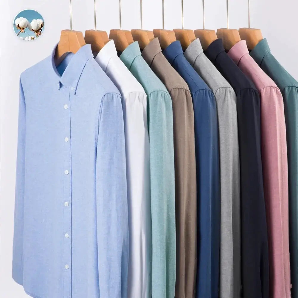 Men's slim-fit Oxford cotton shirts in assorted colors on hangers; long sleeves