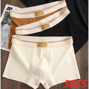 3-pack men's cotton boxers in cream, brown, and black with beige elastic waistband.