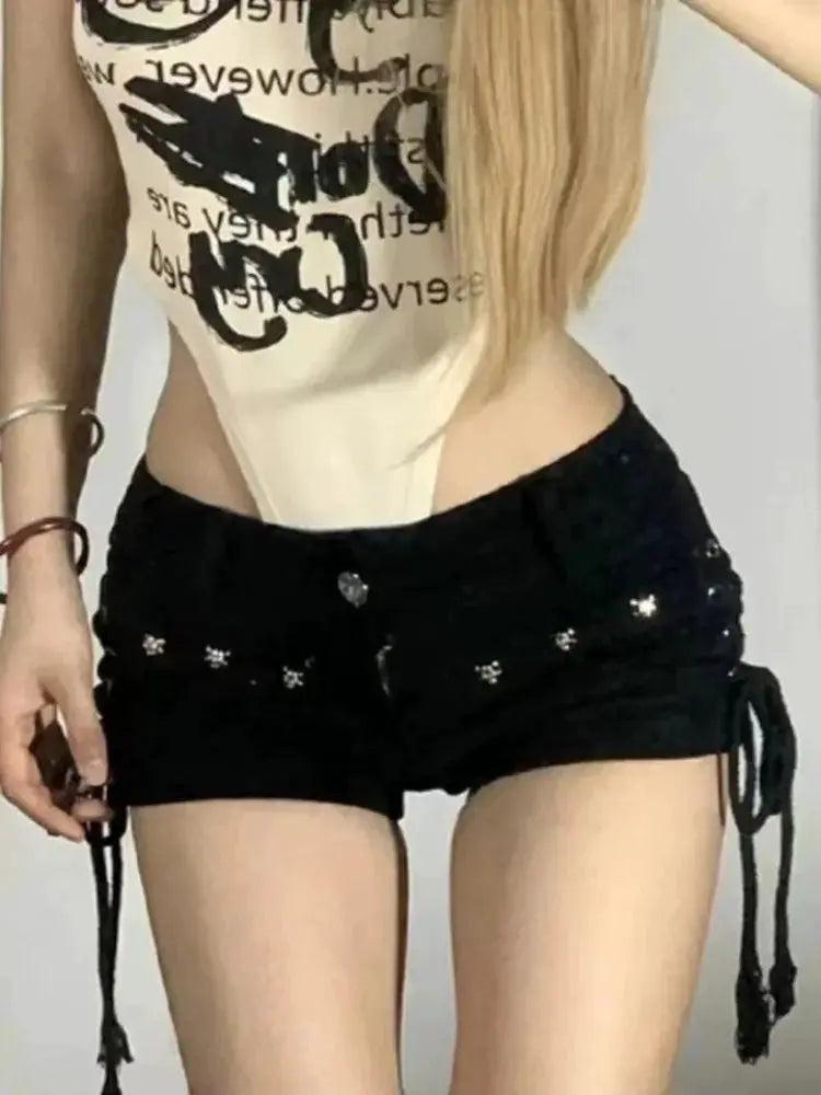 Women's black lace-up shorts with star embellishments and side drawstrings