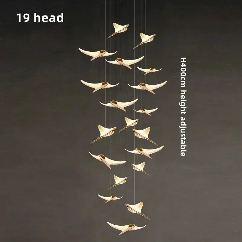 Seagull staircase pendant lamp by Simples Market; 19 cream gull-shaped pendants, long adjustable height for spaces