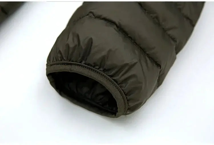 Men's black puffer down jacket sleeve cuff with elastic band and quilted stitching