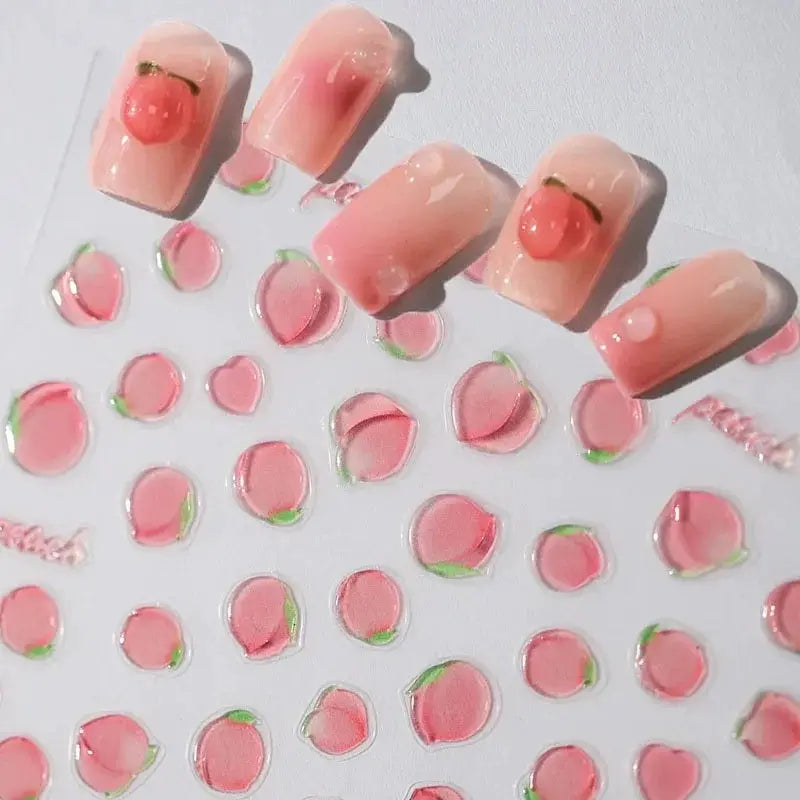 Pink peach jelly nail art stickers by Simples Market with 5D embossed peach shapes; self-adhesive 3D fruit decals