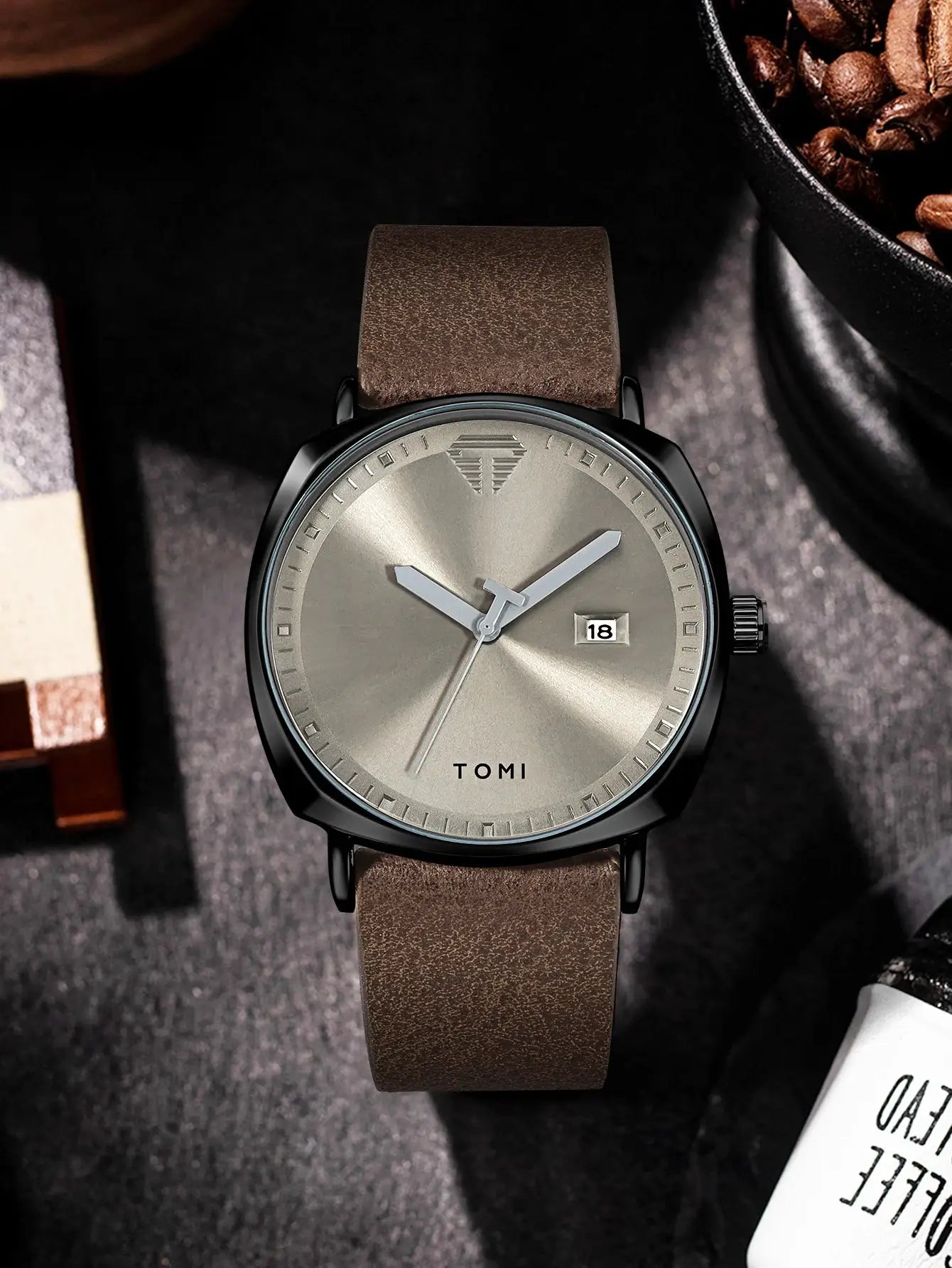 TOMI men's minimalist watch with grey sunburst dial, date window, brown leather strap, black case