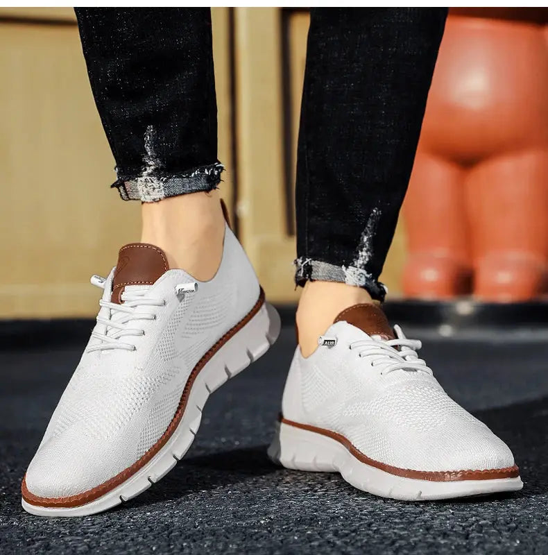 Pair of white mesh breathable casual shoes with brown accents, non-leather men's sneakers in plus sizes 50–54