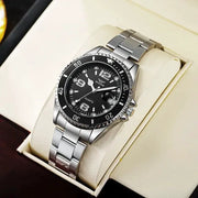 Stainless steel men's quartz wristwatch with black dial, silver bezel, and date magnifier in a display box.