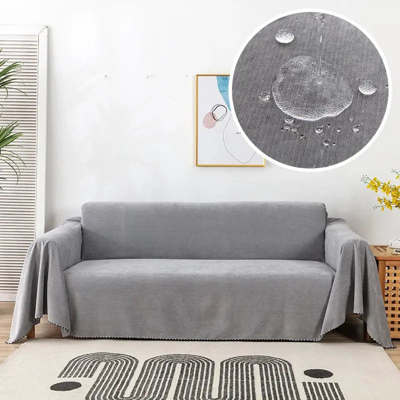 Waterproof sofa towel cover in gray for living room; solid color, durable and dustproof.