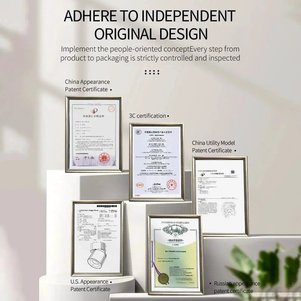 Aisilan LED ceiling spotlight by Simples Market displayed with framed certificates on white pedestals.