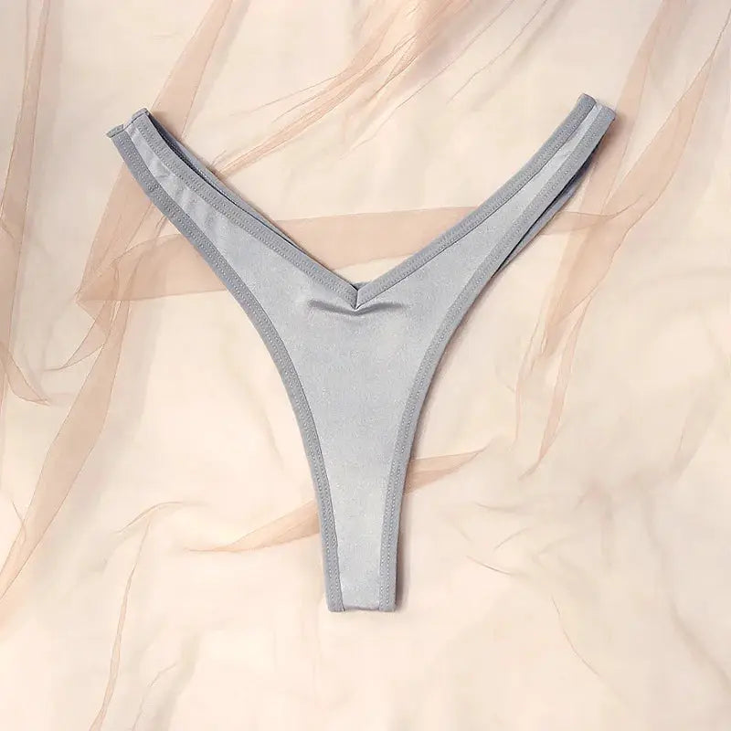 Low-rise thong underwear in metallic gray fabric with V-front design