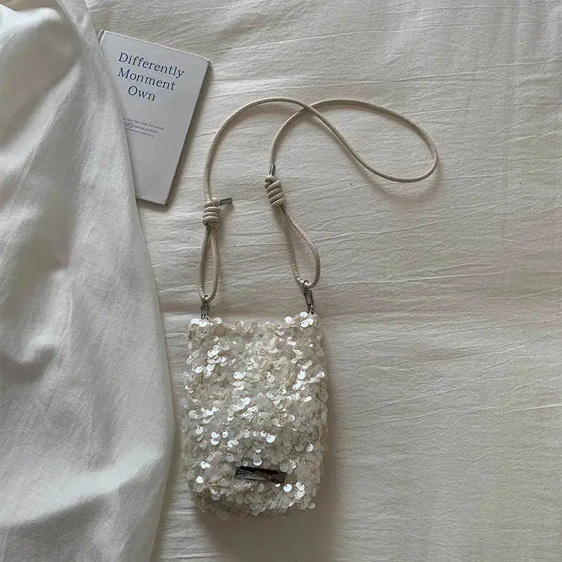 Mini sequined crossbody bag in silver with a beige knotted strap