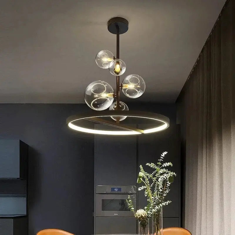 Modern art glass chandelier with brass finish, circular LED ring and glass globe bulbs