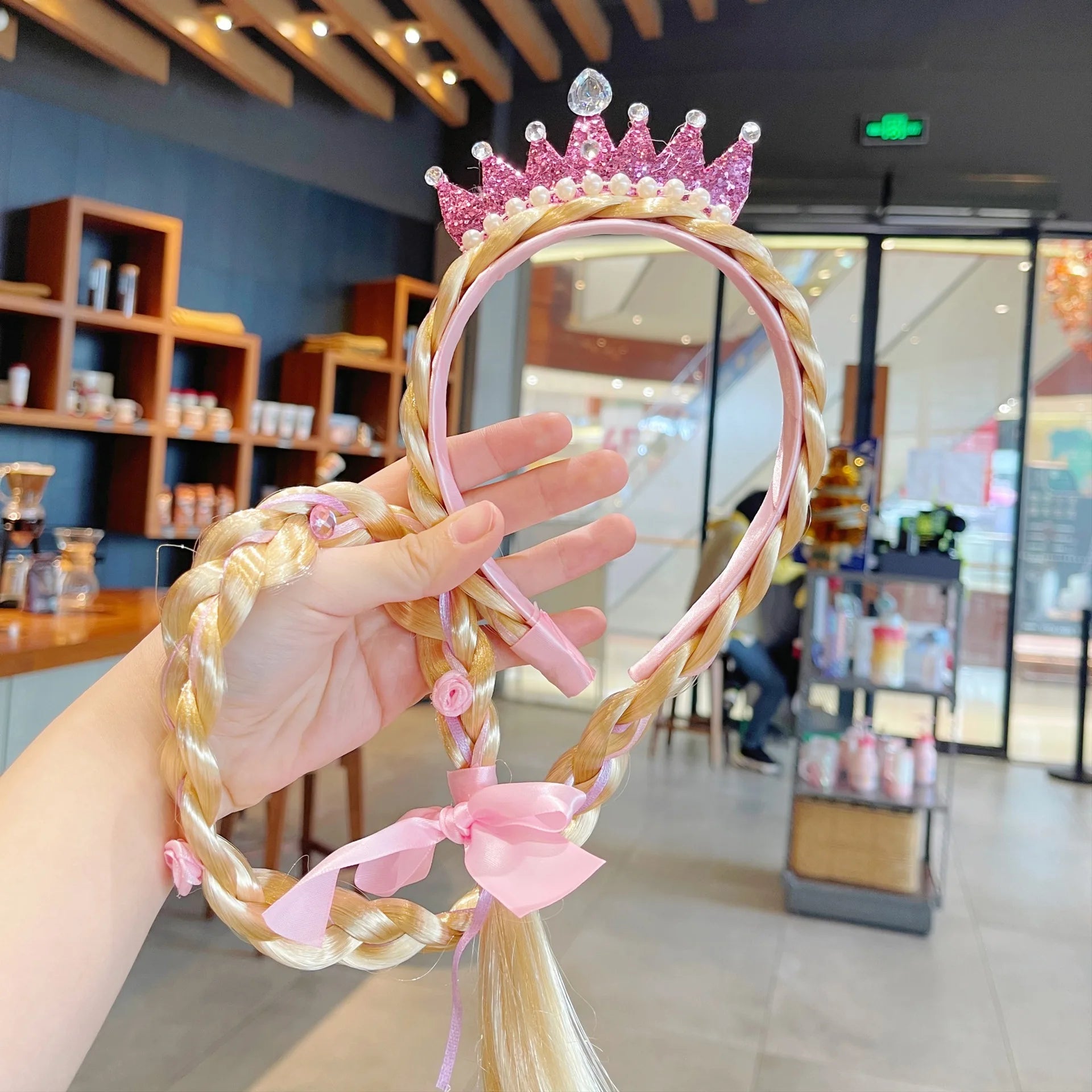 Frozen Elsa crown headband for girls with pink glitter crown and pearl accents.