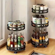 Rotating 3-tier kitchen storage stands by Simples Market; two space-saving black units for spices and bottles.
