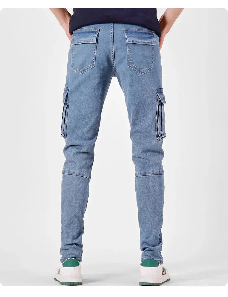 Men's denim cargo pants in washed blue with side cargo pockets and slim fit