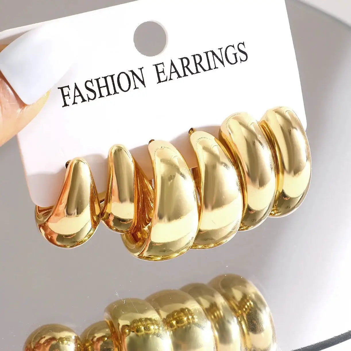 Set of six gold-tone teardrop hoop earrings; chunky crescent fashion jewelry for women