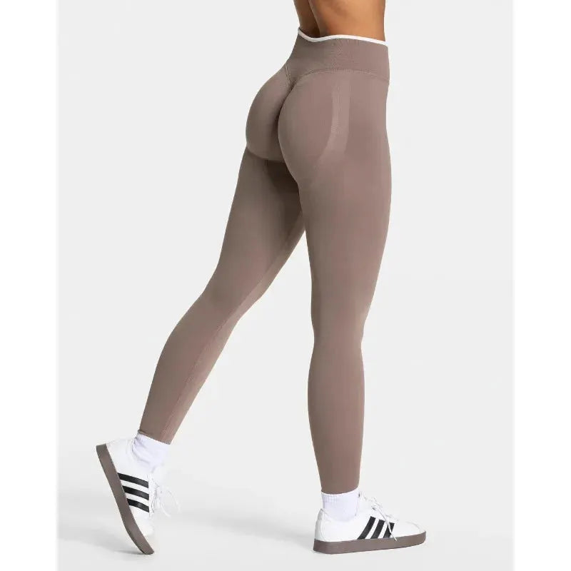 Women's seamless knitted yoga leggings, taupe high-waist hip-lifting tights with white edge.