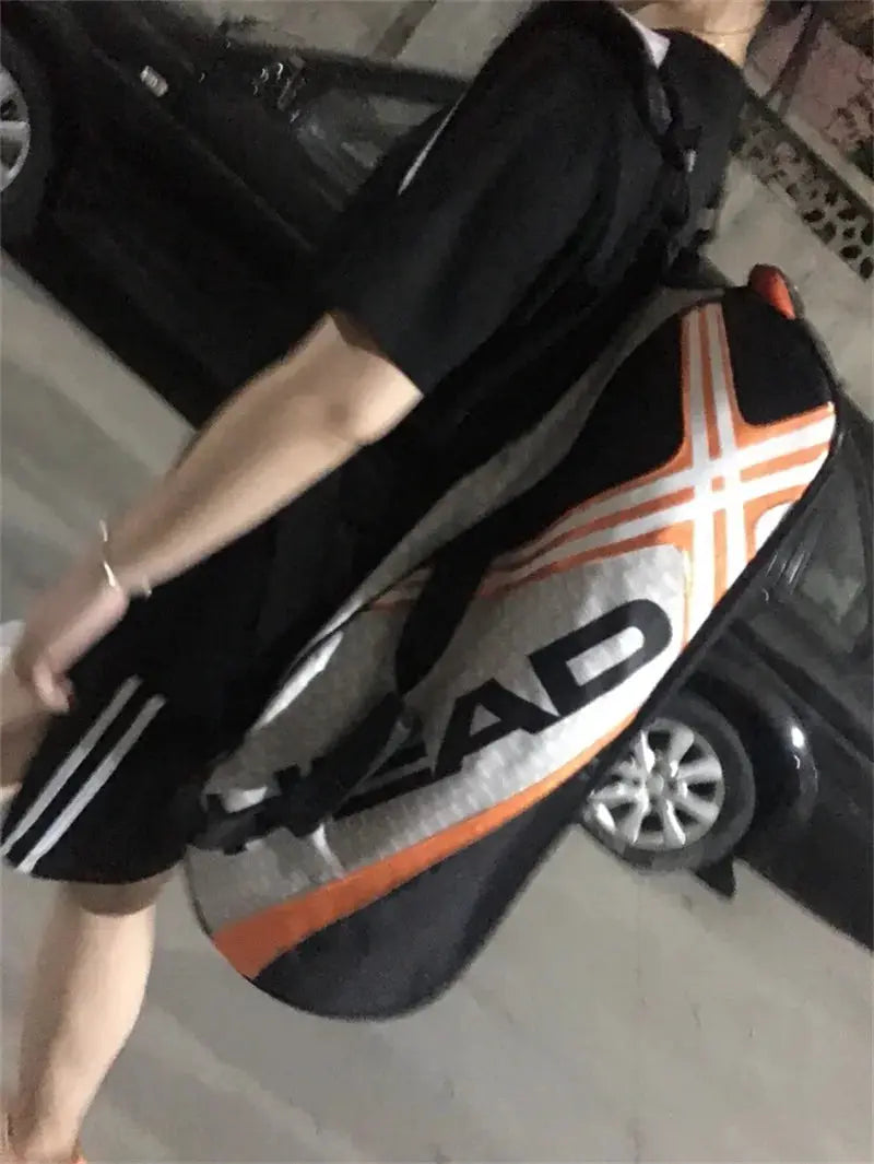 HEAD tennis racket backpack in black with orange/white accents, large capacity for 3–6 racquets