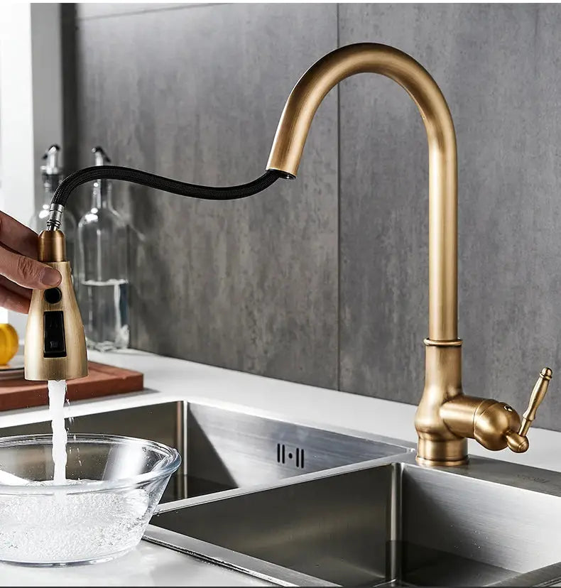 Kitchen faucet in antique bronze with pull-out sprayer and black hose by Simples Market