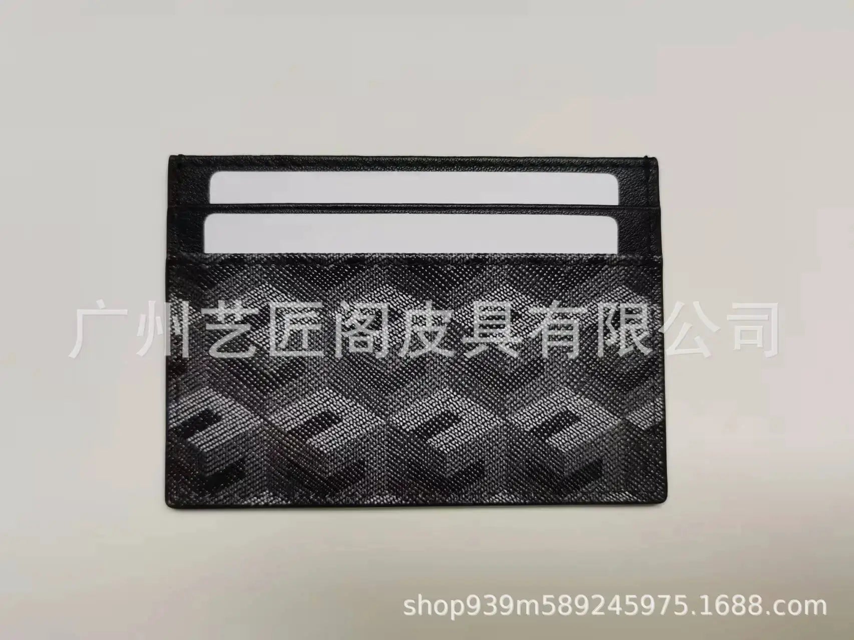 Card holder by Simples Market in black 3D-pattern genuine leather, compact multi-functional.