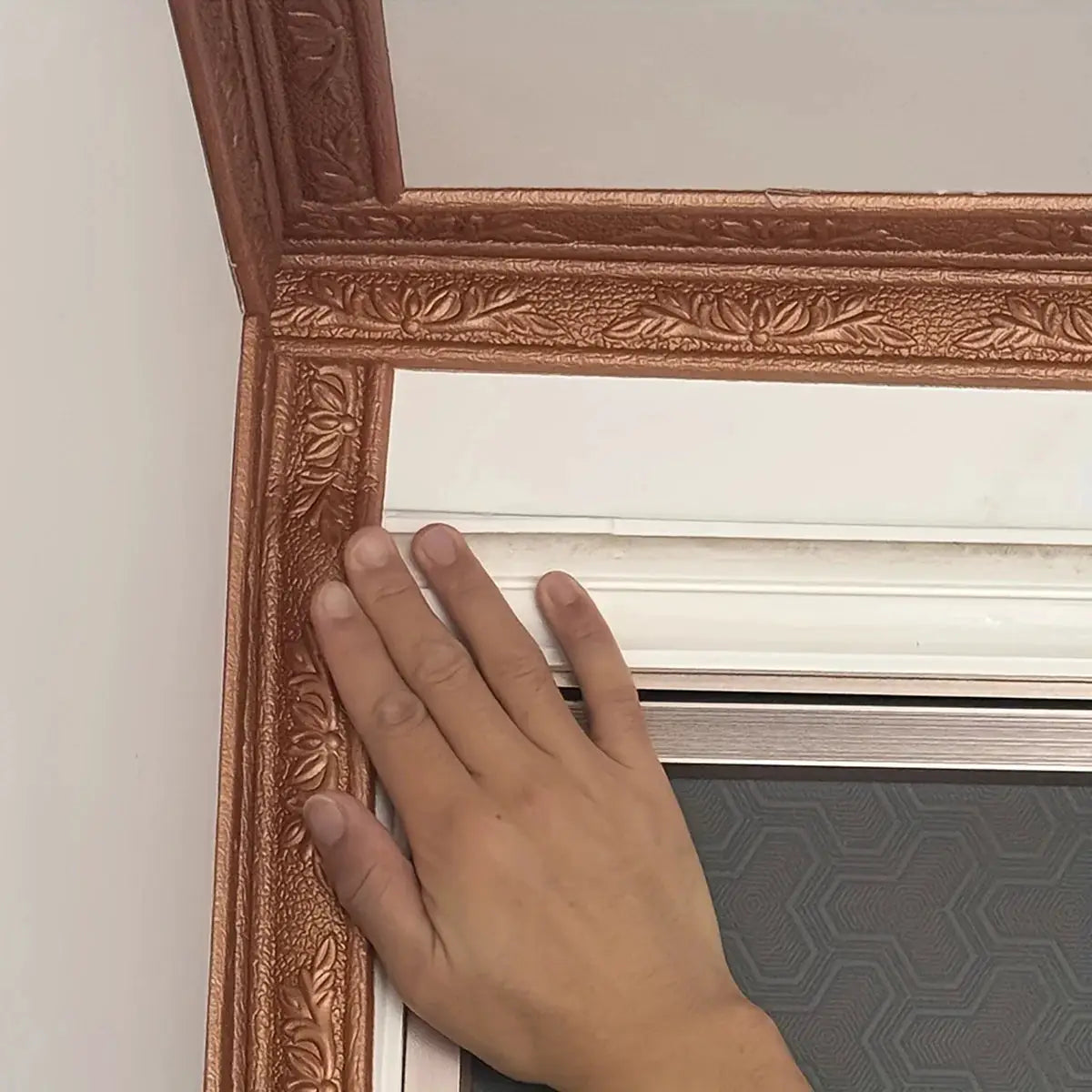Foam wall edge strip stickers by Simples Market 230cm self-adhesive waterproof baseboard corner shown on brown frame.