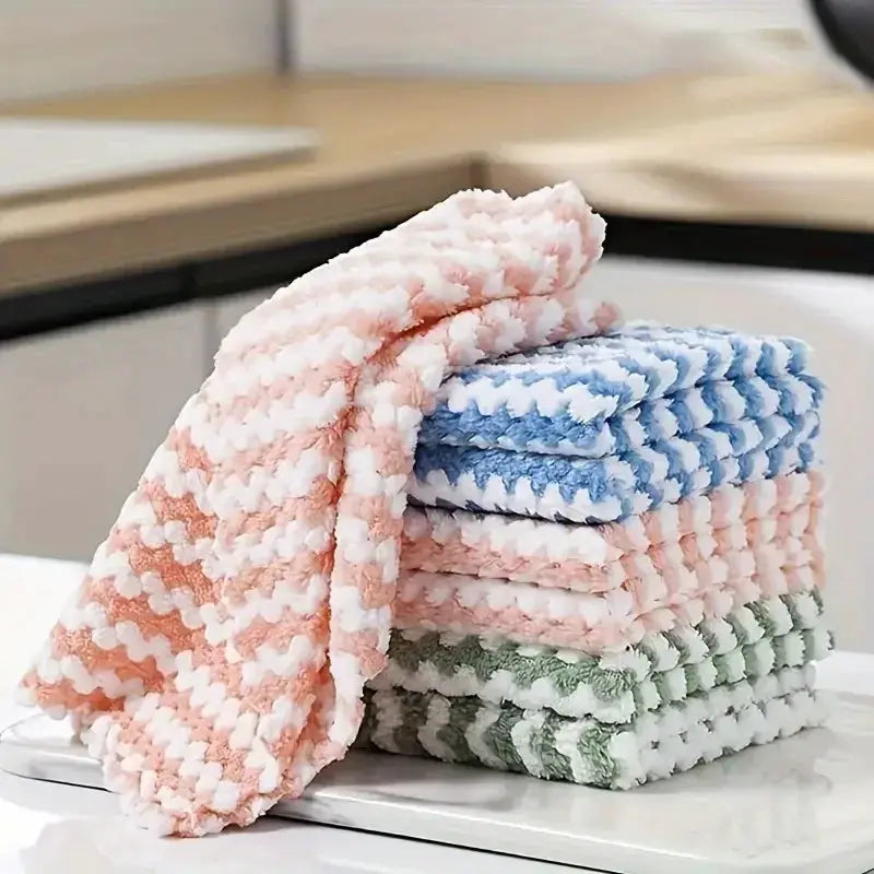 Dishcloths: thick coral fleece cleaning cloths in pastel colors stacked for kitchen and glass cleaning