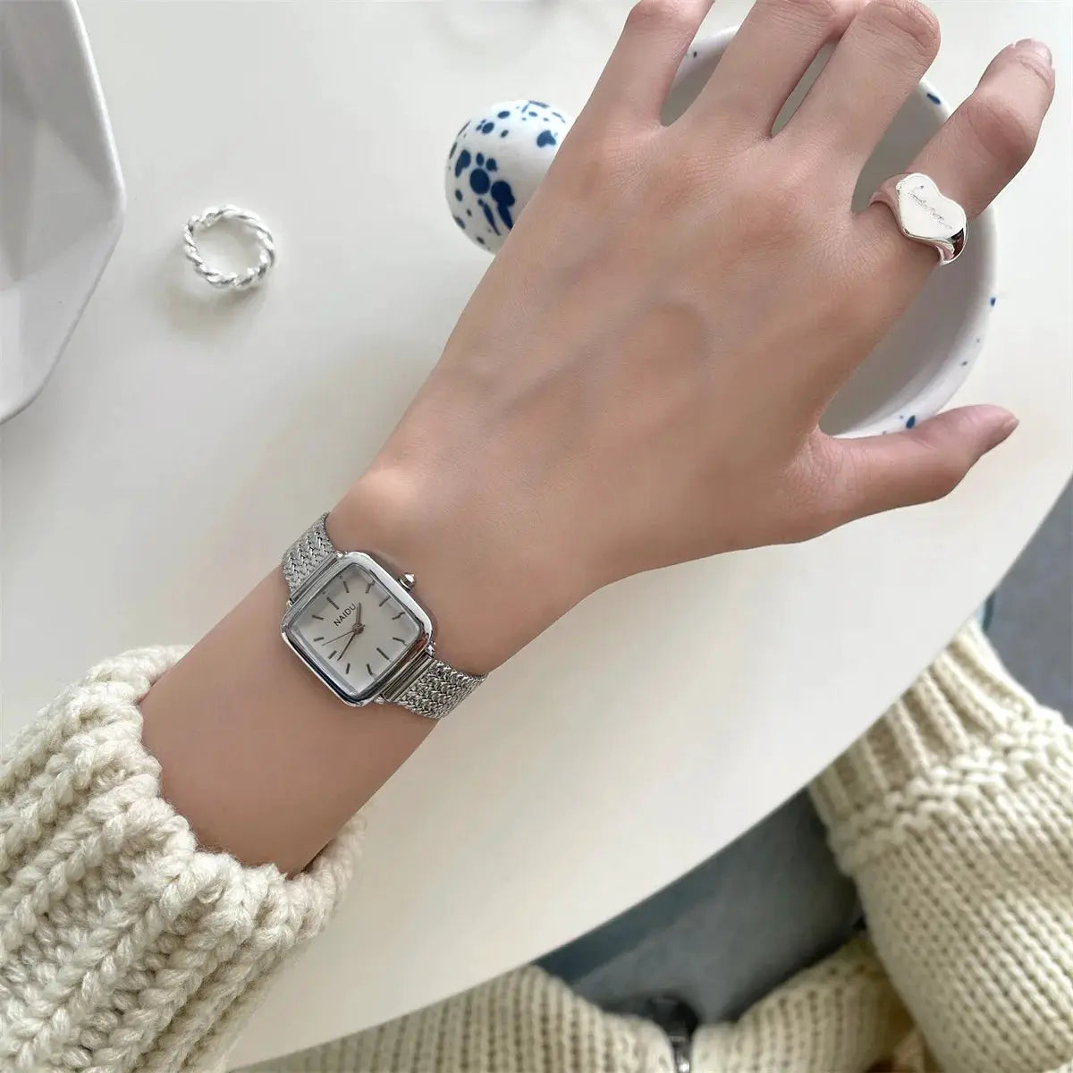 Simples Market women's square quartz watch with stainless steel band and silver-tone case