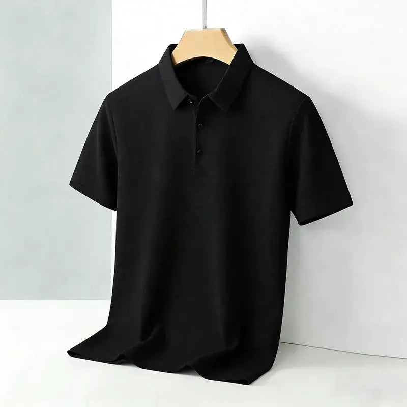 Men's black polo shirt with classic collar and short sleeves on a hanger.