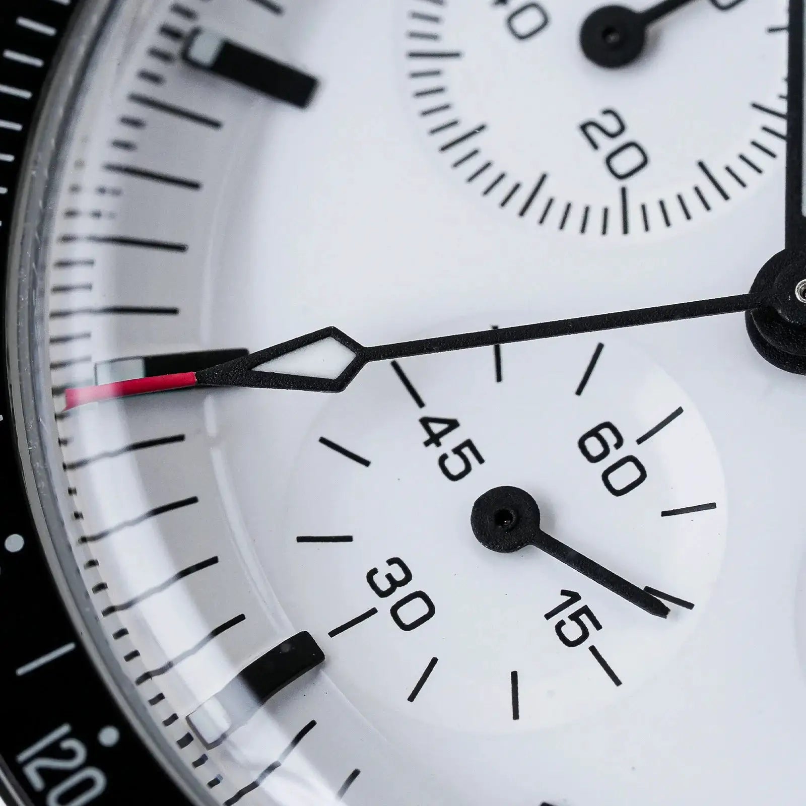 Watchdives WD1863 chronograph watch with white dial, black hands, red-accented tips, and subdials