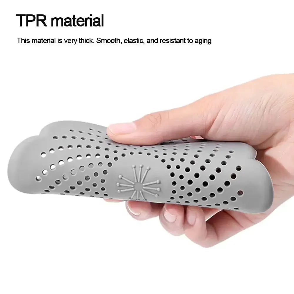 Silicone flower-shaped floor drain cover by Simples Market, gray flexible sink strainer