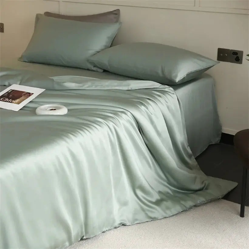 Mulberry silk bedding set by Simples Market; sage green duvet cover, sheet and two pillowcases (4-piece).