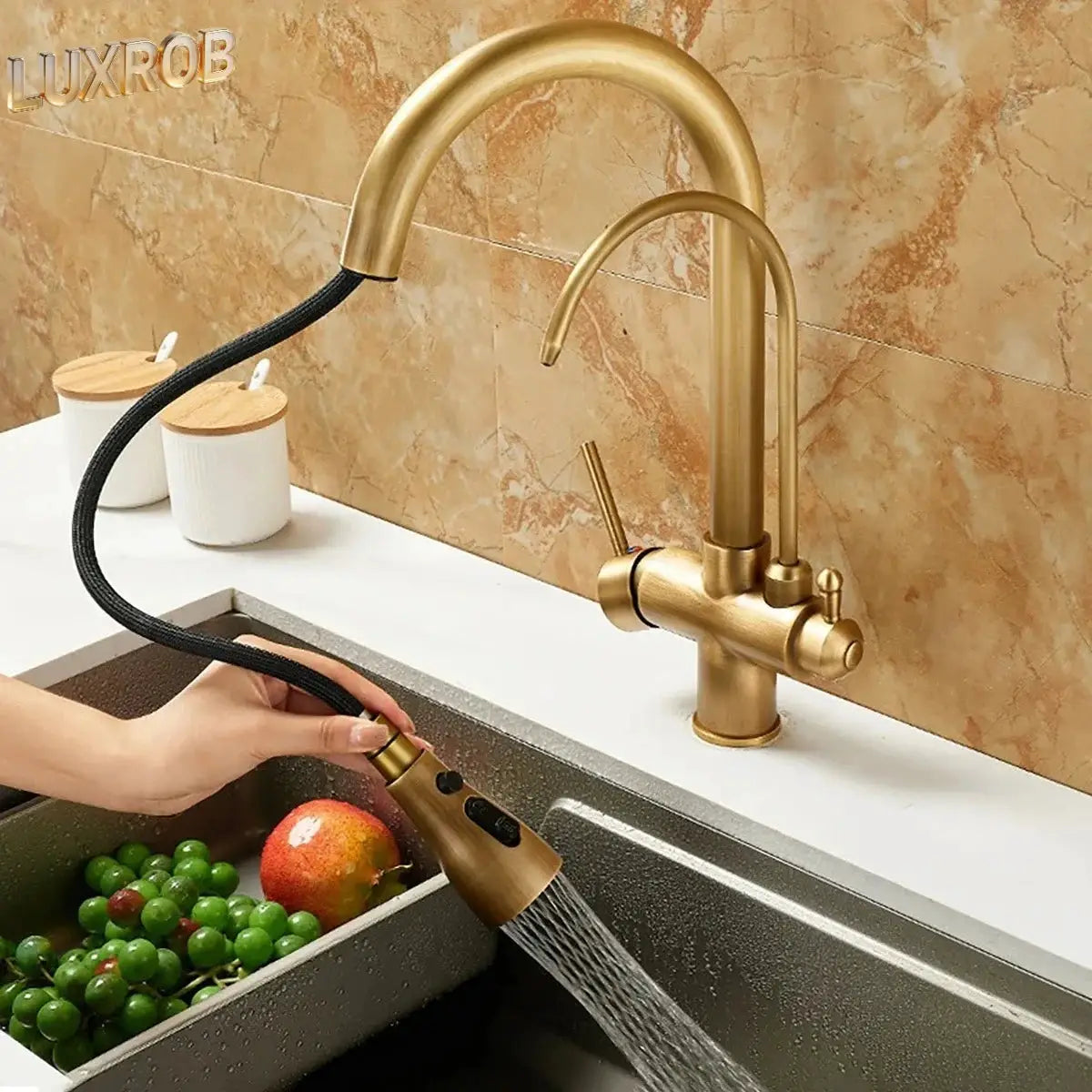 Antique bronze articulated kitchen faucet with pull-out sprayer and hot/cold control