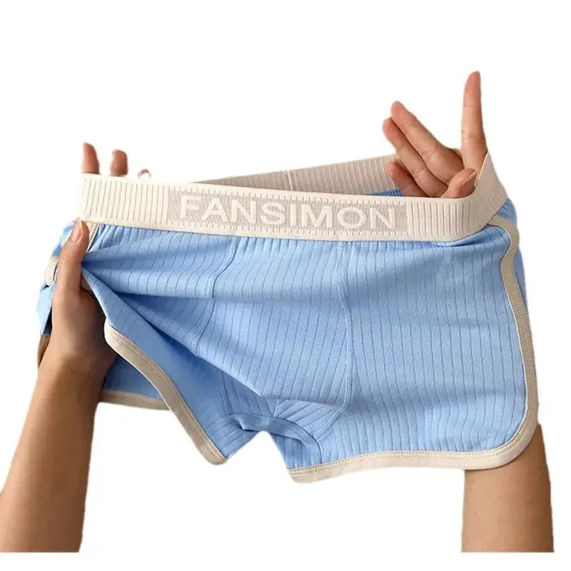 Men's striped blue boxer shorts with beige trim and PANSIMON waistband.