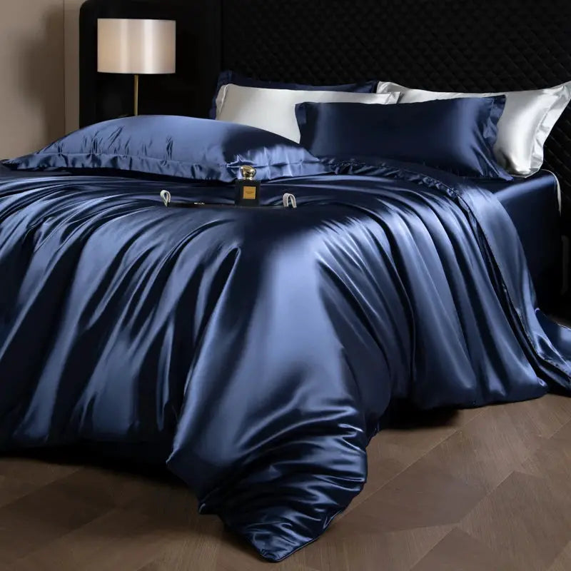 Silk bed sheet set by Simples Market in navy blue with duvet cover, fitted and flat sheets, pillowcases