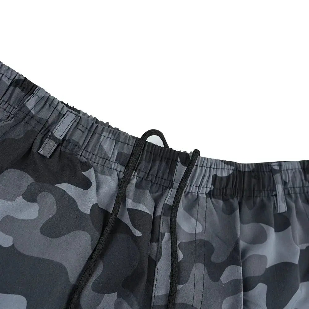 Camouflage cargo shorts with black drawcords and elastic waistband, gray/black camo pattern