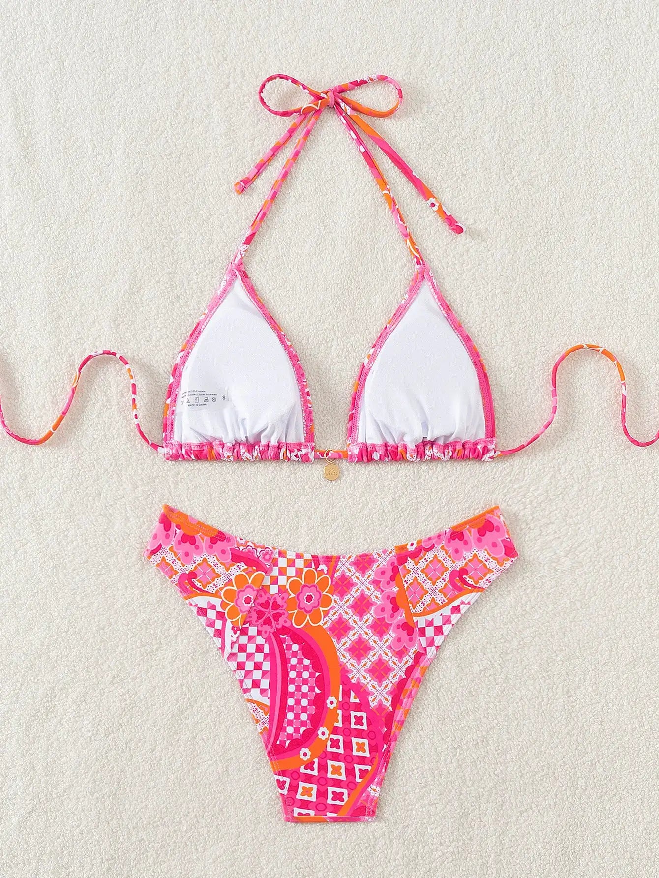 Simples Market floral print triangle bikini set with pink trim, push-up top and Brazilian bottoms
