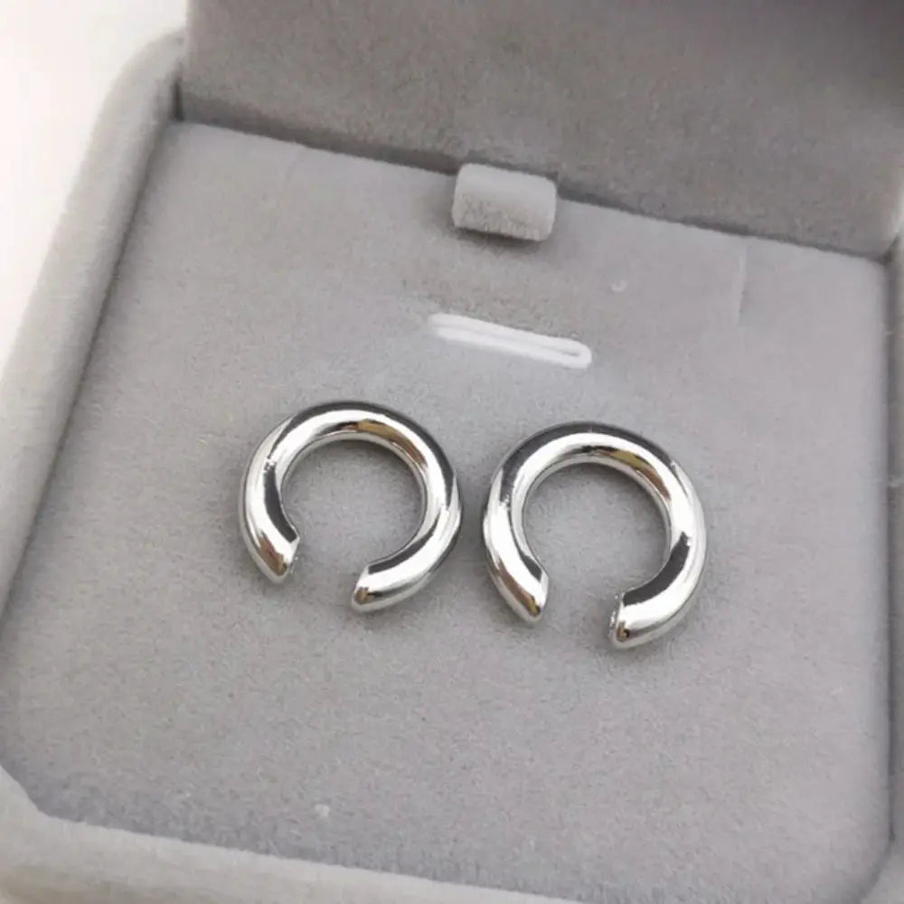Silver-tone ear cuffs for nonpierced ears; minimalist C-shaped geometric earclips, set of 2.