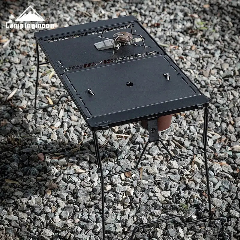 Campingmoon CK-25BK-1PIGT black folding camping table, stove-cover compatible, metal frame.