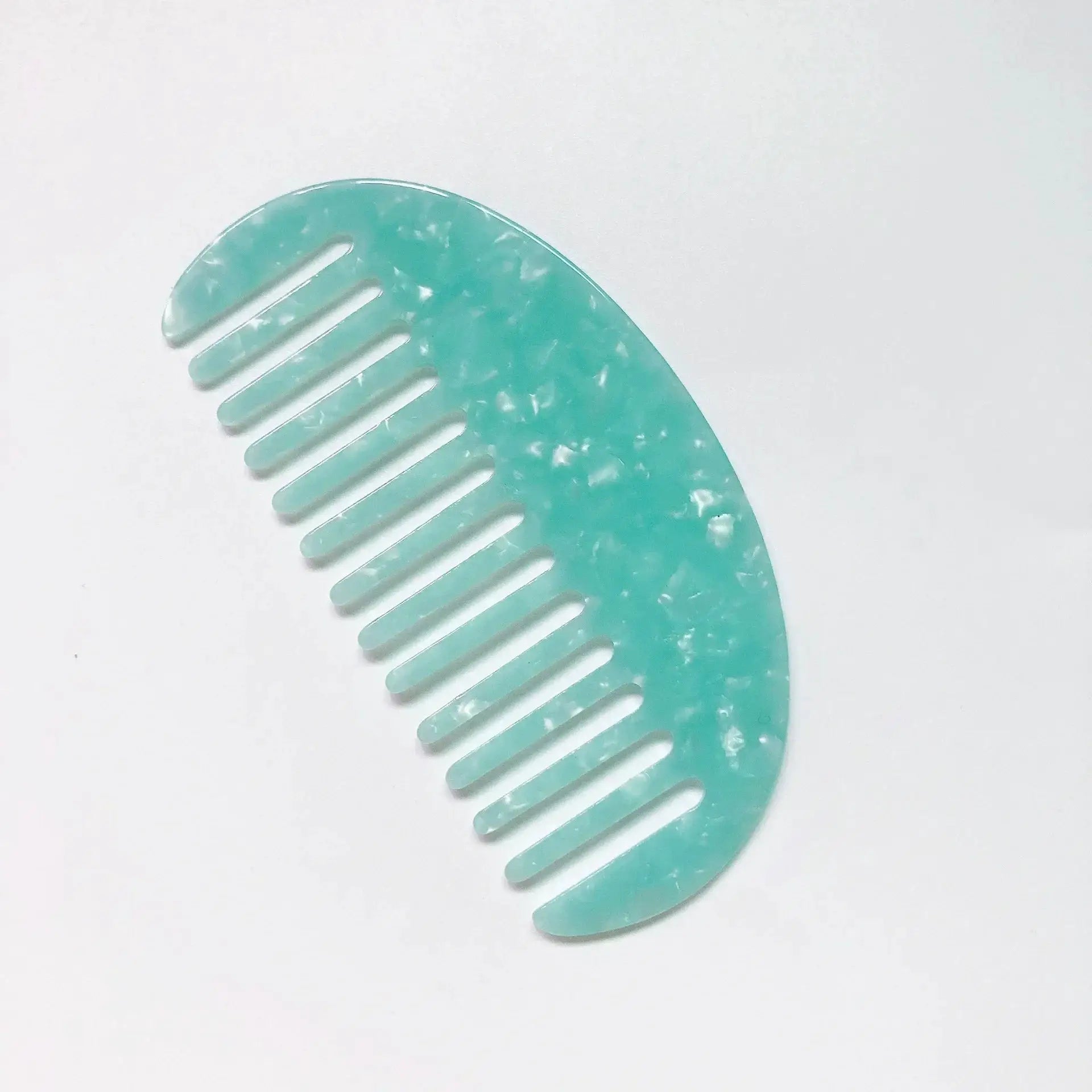 Wide teeth acetate hair comb in turquoise marbled color by Simples Market