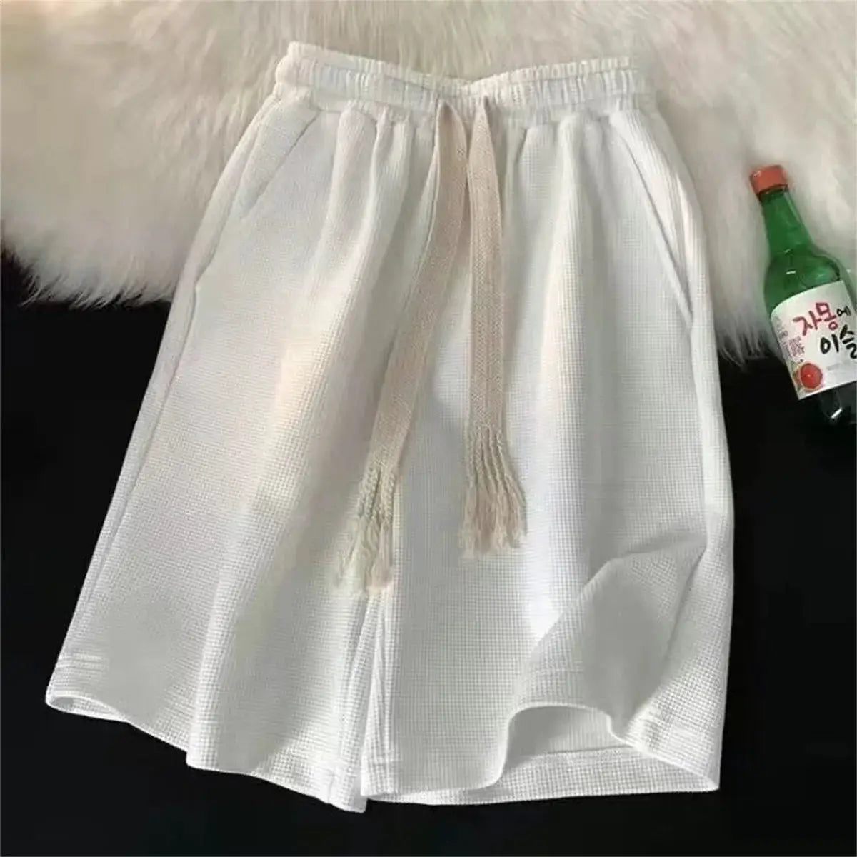 Solid white breathable basketball shorts with drawstring and elastic waistband for summer sports