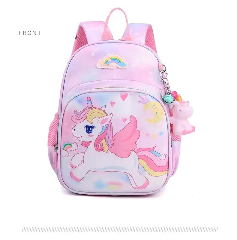 Unicorn backpack for girls in pink and purple with rainbow mane print and plush unicorn charm