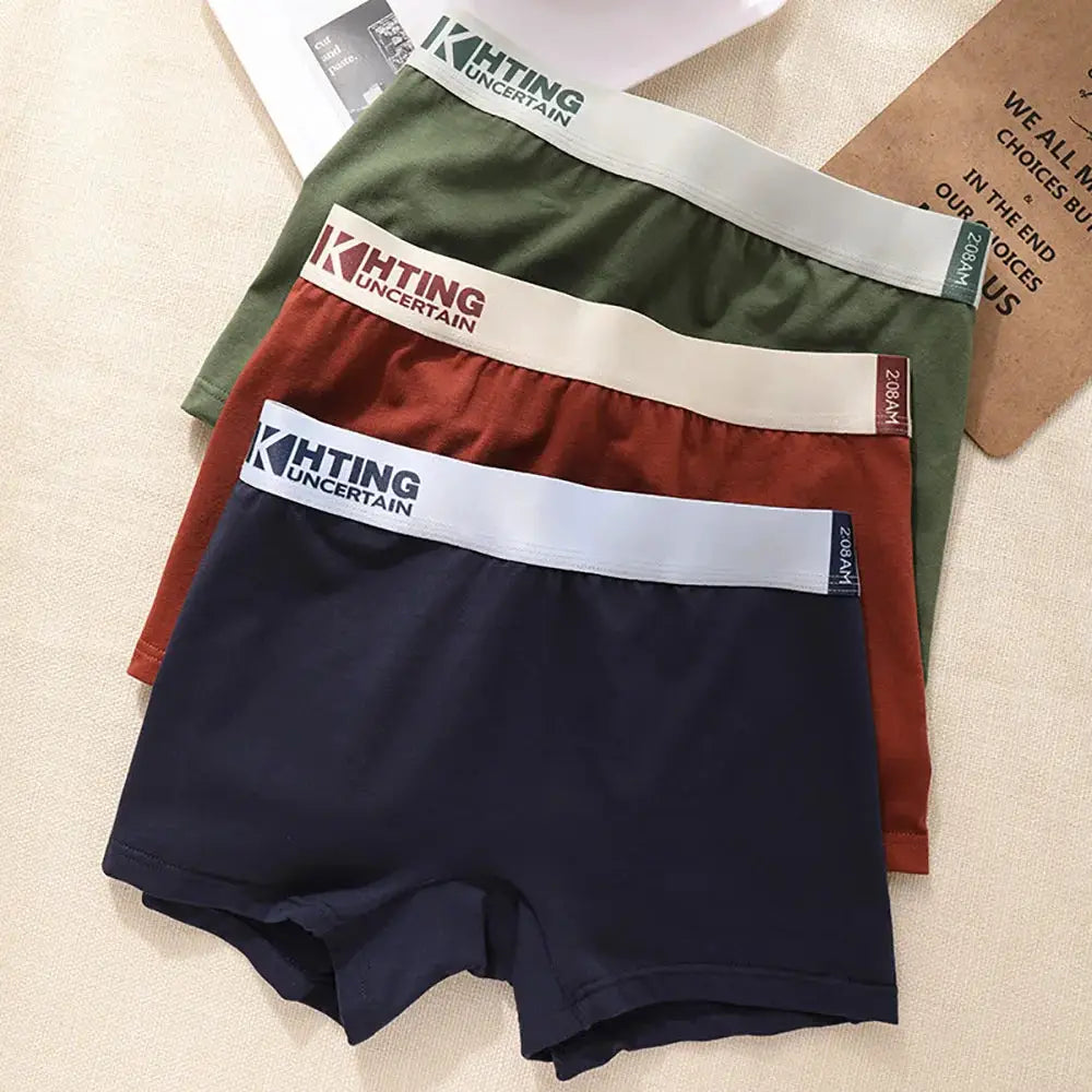 3-pack women's cotton underwear in green, burgundy, and navy with elastic waistbands and KHTING logo