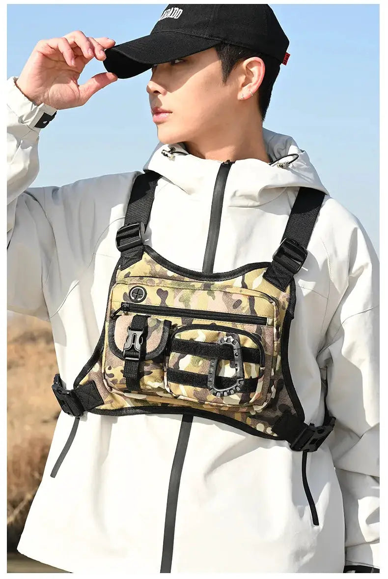 Outdoor Tactical Chest Bag for Men camouflage with multiple pockets and black straps worn over a light jacket