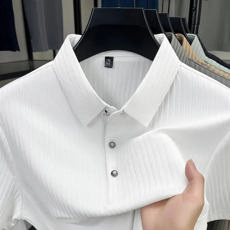 White striped ribbed polo shirt, short-sleeved with collar and button placket on hanger; breathable summer casual.