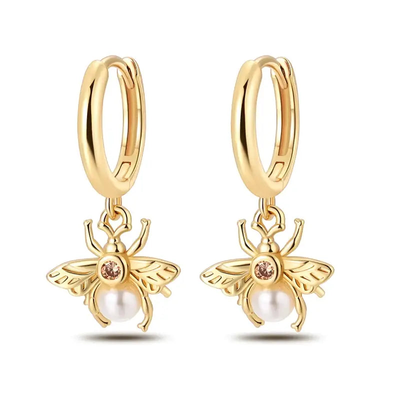 Pair of gold-tone bee pendant hoop earrings with pearl beads and pink crystal accents, Simples Market