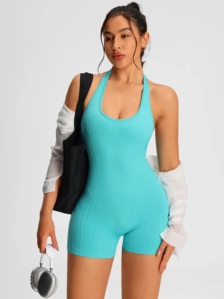 Women's turquoise ribbed romper jumpsuit by Simples Market for gym and yoga