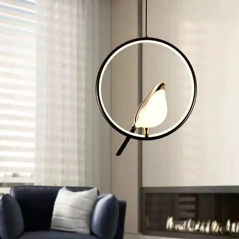 Rotatable Magpie Bird LED Pendant Light by Simples Market, circular ring pendant with gold-silver finish.