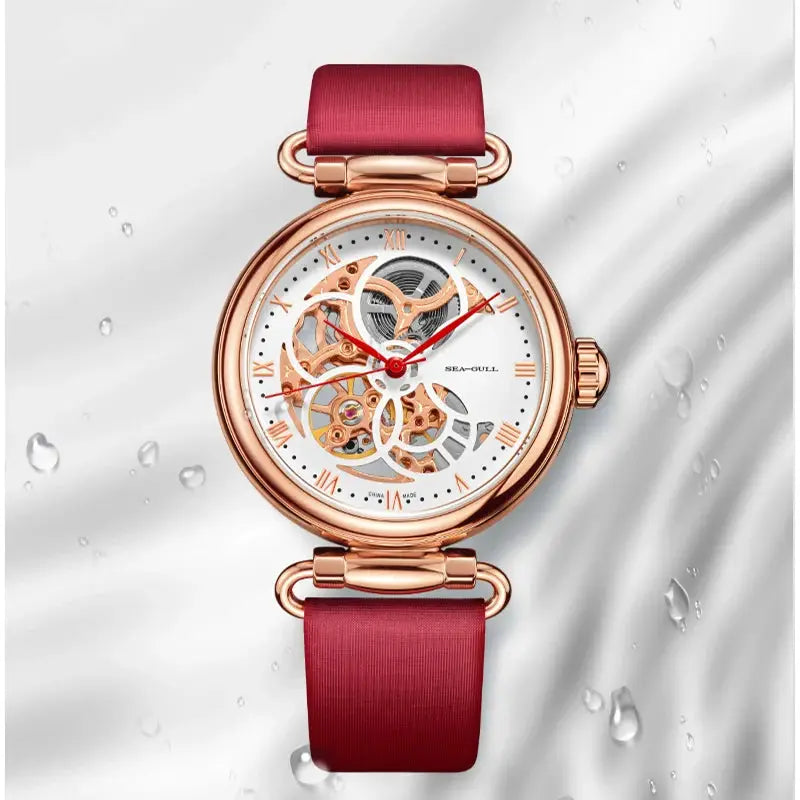 Seagull women's skeleton automatic watch with rose-gold case and red leather strap