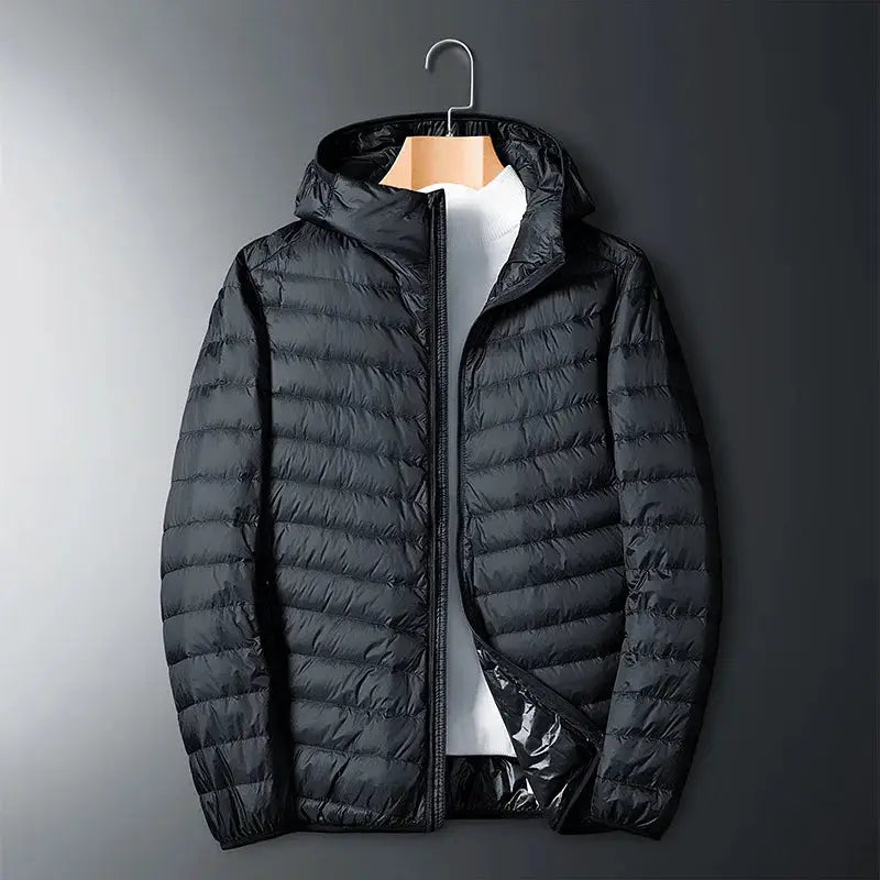 Plus-size men's hooded down jacket, black quilted lightweight puffer with front zipper for winter warmth.