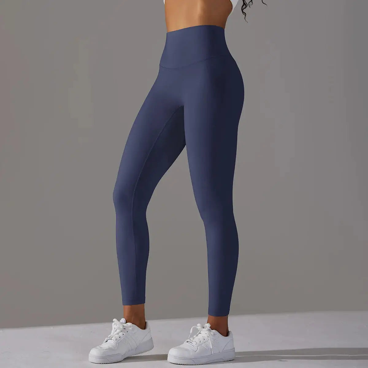 Navy blue high-waist naked-feeling leggings for fitness, running and yoga; body-hugging gym tights