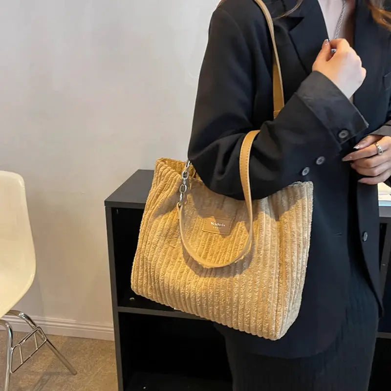 Women corduroy shoulder bag by Simples Market; camel beige, fixed shoulder strap, large-capacity casual handbag.